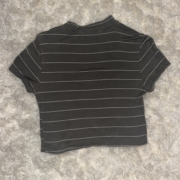 This is a very soft crop top that’s a very muted olive green - Picture 2 of 2